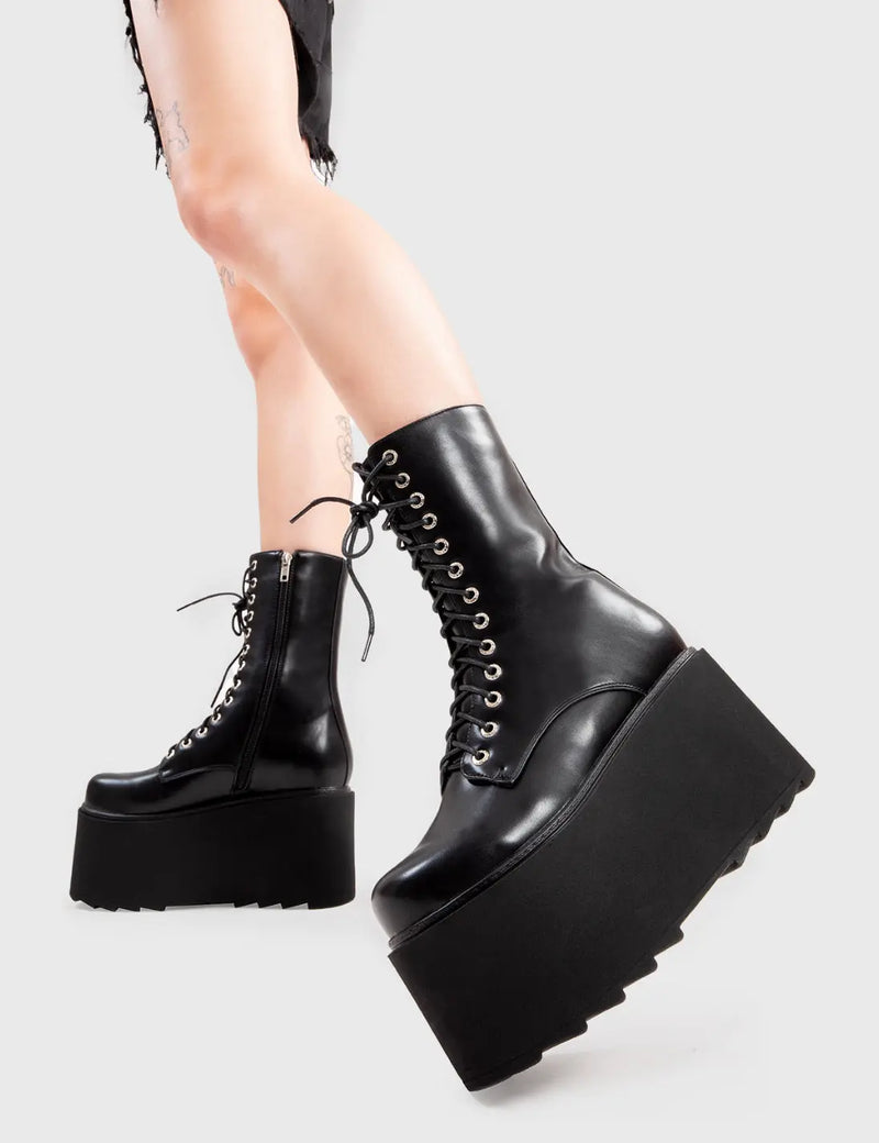 Step Out in Fashion
  
  Steady Chunky Platform Ankle Boots in Black faux leather. These flatform shoes feature a lace-up design, on our flatform sole. Made with eco-friendly materials and 100% cruelty-free, these platform boots are as ethical as they are Edgy
  
  - Platform Height
  - lace-up
  - Flatform Sole
  - Shark's Teeth Grip
  - 100% vegan 
  
  SKU: LMF 3145 - BlackPU