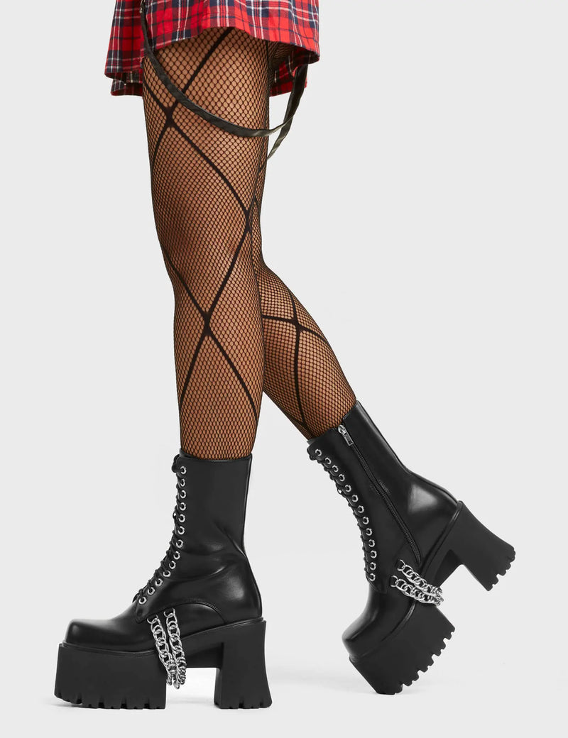 FAST LANE
 
 Step On It Chunky Platform Ankle Boots in black faux leather. These black vegan Platform Boots feature lace up design with sillver eyelets and two silver aestehtic chains. Also includes a functional zip on our rubber grip, chunky platform sole. Made with eco-friendly materials these platform boots are as ethical as they are perfect!
 
 
 - Platform Height: 
 - Black Zipper
 - Lace Up Design 
 - Silver Eyelets
 - Silver Chains
 - Chunky Platform Sole
 - 100% vegan
 
 SKU: LMF 4118 - BlackPU