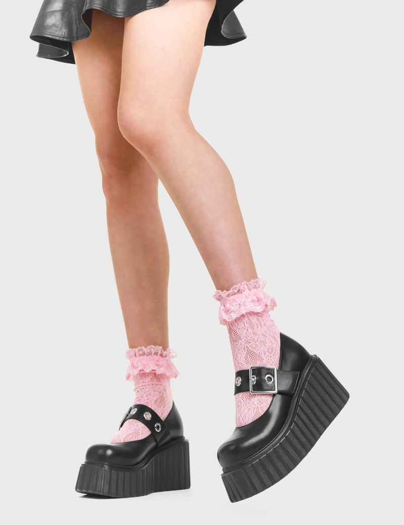 FIGHTER Survivor Chunky Platform Creeper Shoes in Black Faux Leather. These vegan western Boots feature silver eyelets on a adjustable strap with a oversized silver buckle, very classy. Made with eco-friendly materials and 100% cruelty-free, these boots are as ethical as they are edgy! - Chunky Platform - Ankle length - Adjustable strap - Silver buckle - Silver Eyelets - Rounded toe - 100% vegan SKU: LMF 3612 - BlackPU