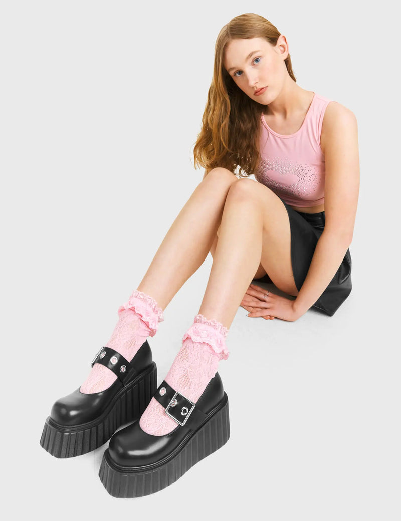 FIGHTER Survivor Chunky Platform Creeper Shoes in Black Faux Leather. These vegan western Boots feature silver eyelets on a adjustable strap with a oversized silver buckle, very classy. Made with eco-friendly materials and 100% cruelty-free, these boots are as ethical as they are edgy! - Chunky Platform - Ankle length - Adjustable strap - Silver buckle - Silver Eyelets - Rounded toe - 100% vegan SKU: LMF 3612 - BlackPU