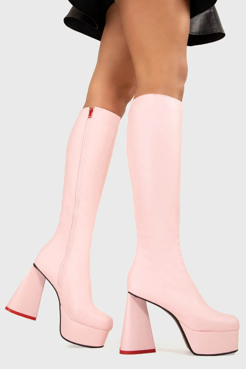 LOVEABLE 
  
  Sweet Talker Wide Calf Platform Knee High Boots in Pink faux leather. These platform boots feature a minimalist look with a heart shaped heel, keeping it nice and classy. Made with eco-friendly materials and 100% cruelty-free, these platform boots are as ethical as they are chic.
  
  - Platform Height
  - Knee length
  - Heart shaped heel
  - Red sole
  - Wide calf 
  - Pink zip
  - High Heel
  - 100% vegan 
  
  SKU: LMF 3313 - PinkPU - WIDE FIT