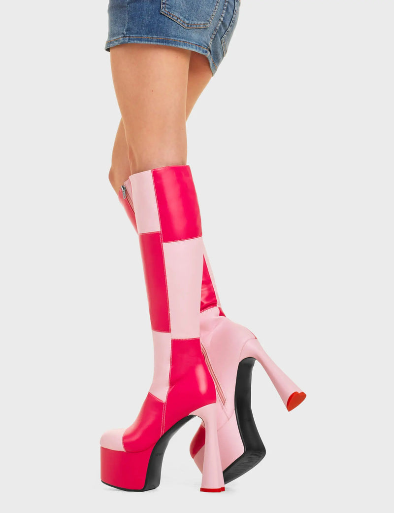SPLIT SCREEN
  
  Sweet Tooth Platform Knee High Boots in Pink and Fuchsia faux leather. These platform boots feature a pink and fuchsia patch work design with a heart shaped heel and a red heart at the bottom. Made with eco-friendly materials and 100% cruelty-free, these platform boots are as ethical as they are chic.
  
  - Platform Height
  - Knee high length
  - Patch work design
  - Heart heel
  - Red Heart
  - High Heel
  - 100% vegan
  
  SKU: LMF 4474 - PinkPU/FuchsiaPU