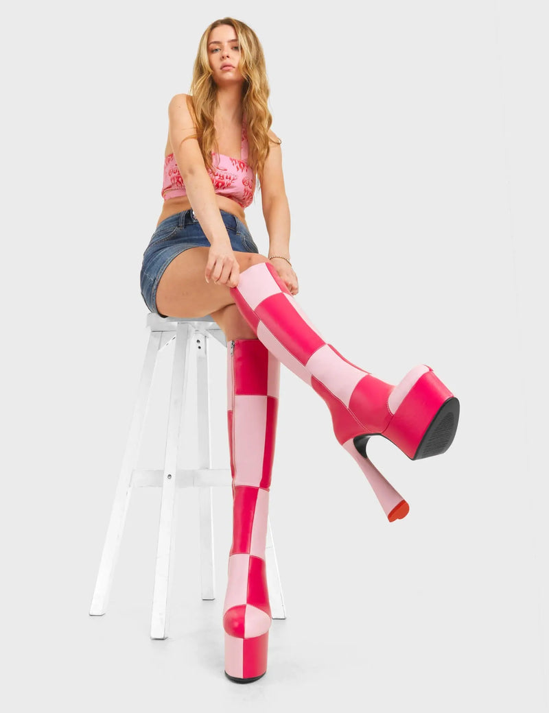 SPLIT SCREEN
  
  Sweet Tooth Platform Knee High Boots in Pink and Fuchsia faux leather. These platform boots feature a pink and fuchsia patch work design with a heart shaped heel and a red heart at the bottom. Made with eco-friendly materials and 100% cruelty-free, these platform boots are as ethical as they are chic.
  
  - Platform Height
  - Knee high length
  - Patch work design
  - Heart heel
  - Red Heart
  - High Heel
  - 100% vegan
  
  SKU: LMF 4474 - PinkPU/FuchsiaPU