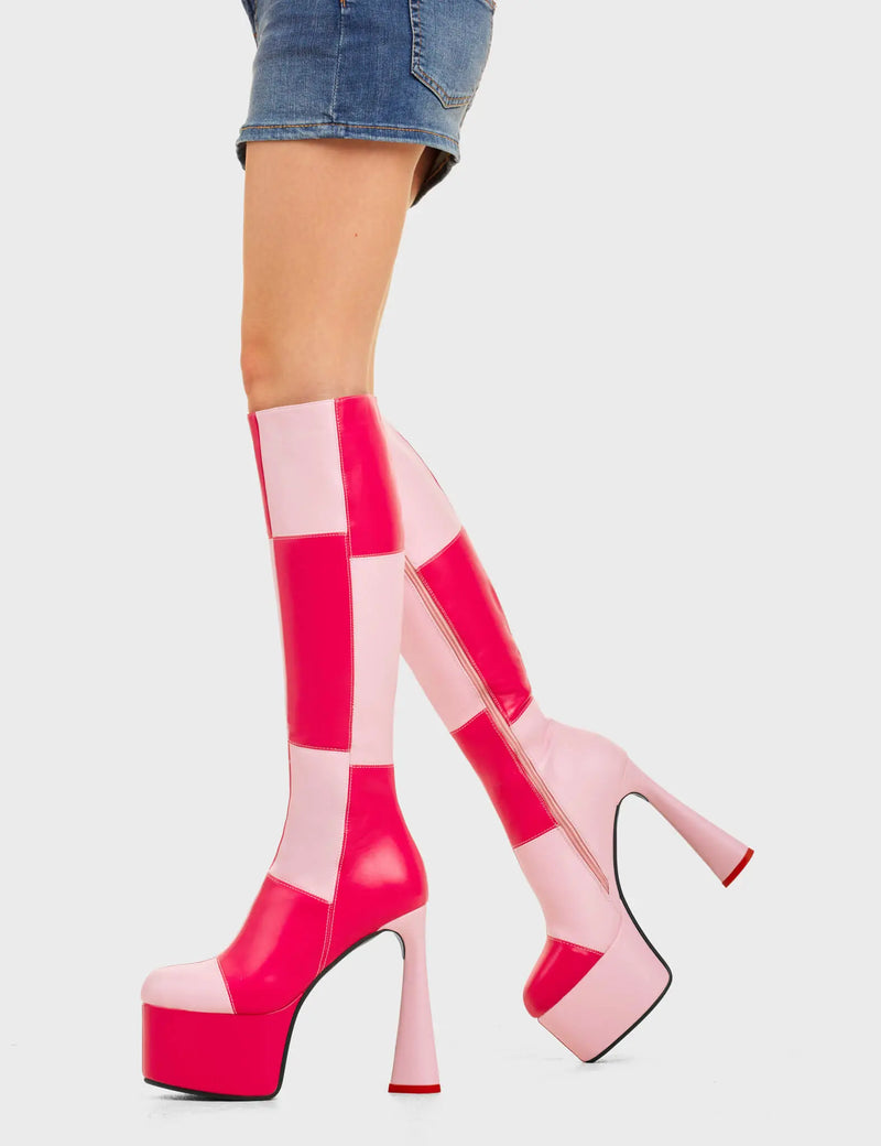 SPLIT SCREEN
  
  Sweet Tooth Platform Knee High Boots in Pink and Fuchsia faux leather. These platform boots feature a pink and fuchsia patch work design with a heart shaped heel and a red heart at the bottom. Made with eco-friendly materials and 100% cruelty-free, these platform boots are as ethical as they are chic.
  
  - Platform Height
  - Knee high length
  - Patch work design
  - Heart heel
  - Red Heart
  - High Heel
  - 100% vegan
  
  SKU: LMF 4474 - PinkPU/FuchsiaPU