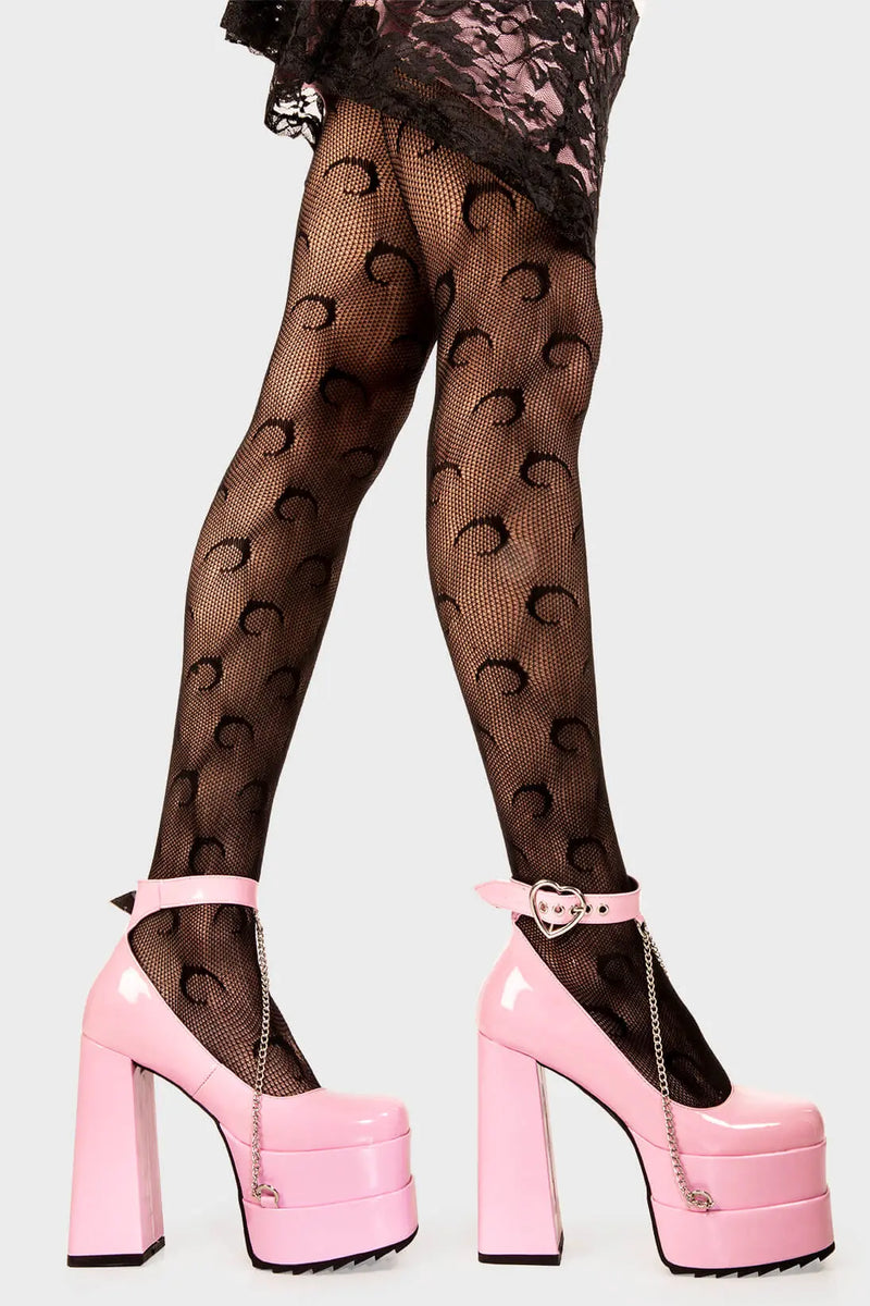 Sweetheart Soles
  
  Sweetheart Platform Heels in Pink Patent faux leather. These pink vegan Platform Heels feature on our double stack platform sole with a pink ankle strap and a heart shaped buckle including a silver chain handing from the ankle strap, setting trends one step at a time. 
  
  
  - Platform Height
  - Heel Height 
  - Heart shaped buckle
  - Pink strap with silver eyelets
  - Shark's teeth rubber grip 
  - Chunky platform sole
  - Square Toe
  - 100% vegan 
  
  SKU: LMF 2091 - PinkPAT