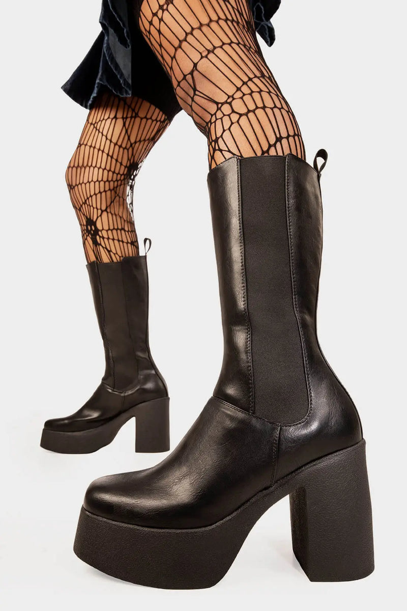 ANYTIME ANYWHERE

Takeover Platform Calf Boots in Black faux leather. These Black vegan Boots feature an elegant, minimalist design, perfect for adding height and style to any outfit. Made with eco-friendly materials and 100% cruelty-free, these boots are as ethical as they are stylish.


- Platform Height: 1.25 inch
- Heel Height: 4 inch
- Wide ankle friendly
- Wide calf friendly
- Calf High length
- Black elastic gusset
- Platform sole
- Round toe 
- 100% vegan 

SKU: LMF 1216 - BlackPU