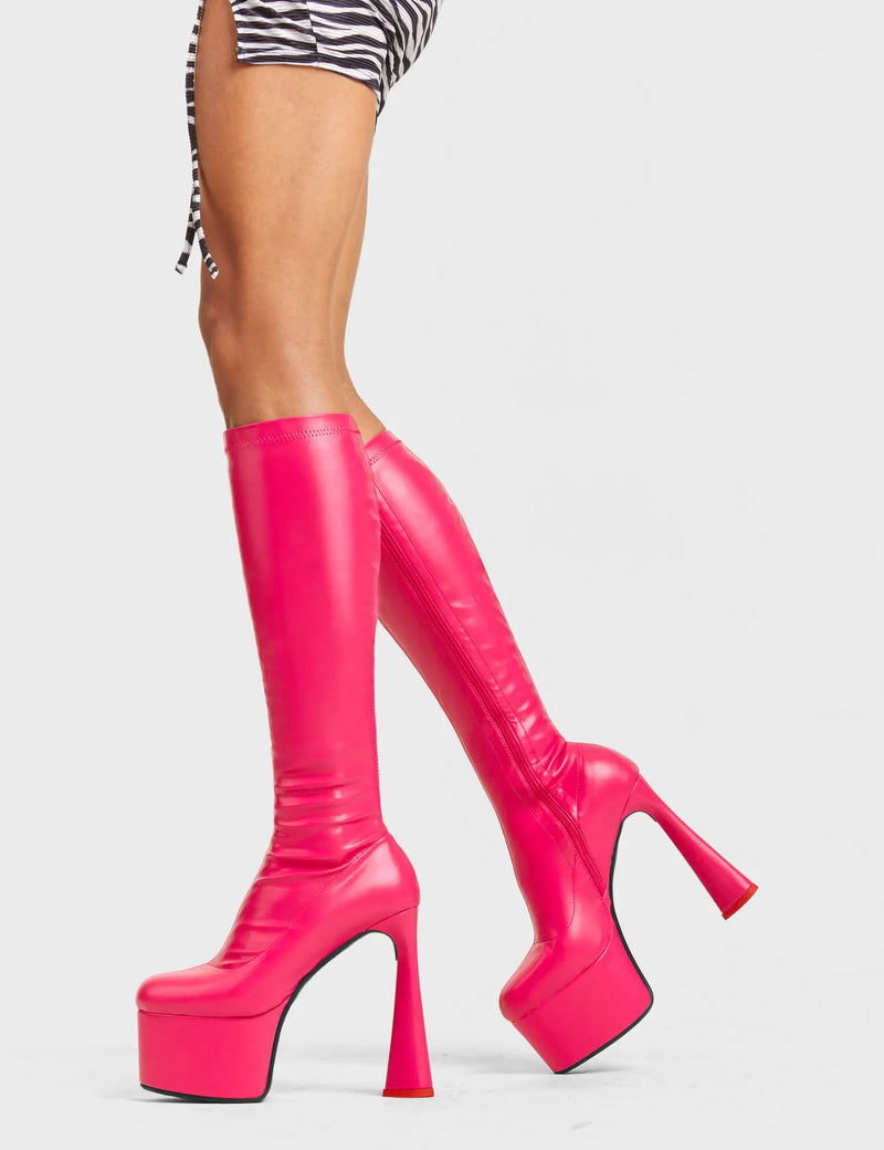 FOREVER TOGETHER
 
 Talk Platform Knee High Boots in Fuchsia Stretch faux leather. These platform boots feature on our platform sole and highlights our heart shaped heel with a red heart at the bottom. Made with eco-friendly materials and 100% cruelty-free, these platform boots are as ethical as they are Legendary!
 
 - Platform Height
 - Heel Height
 - Black Zip
 - Knee High Length
 - Stretch Upper
 - Platform Sole
 - Heart Heel
 - Heart Detail
 - Round Toe
 - 100% vegan
 
 SKU: LMF 4471 - FuchsiaPU