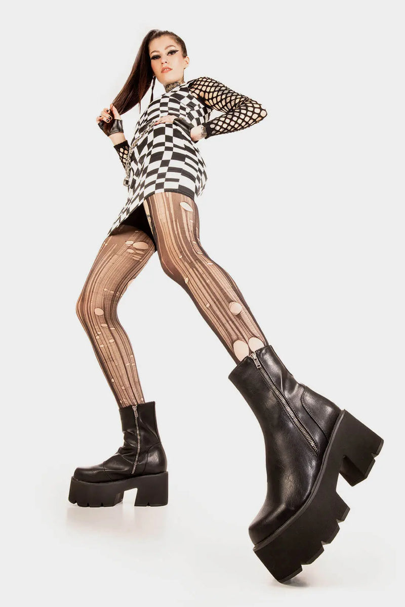 Trendsetter 
  
  Tell Me Lies Chunky Platform Boots. These black vegan Platform Boots feature on our chunky platform sole, comfortable , classic and all round confident. Made with eco-friendly materials and 100% cruelty-free, these platform boots are as ethical as they are cute!
  
  
  - Platform Height: 3 inch
  - Silver zipper 
  - Chunky Platform sole
  - Round Toe
  - 100% vegan 
  
  SKU: LMF 1845 - BlackPU