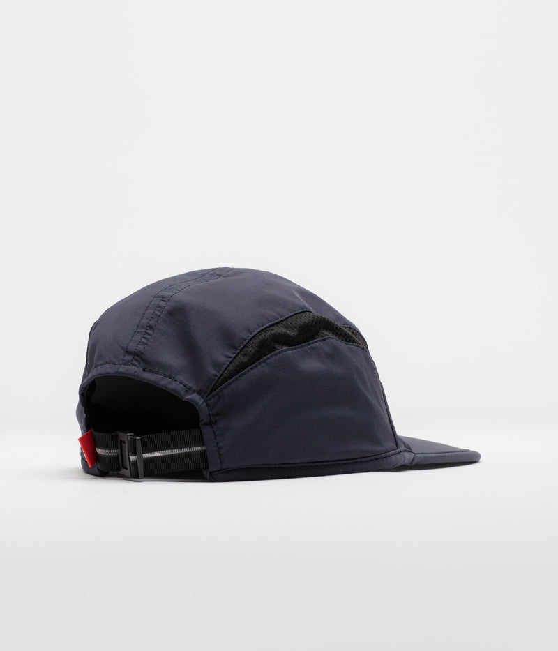 The Trilogy Tapes Clogged Bear Running Cap in Metallic Navy and Black