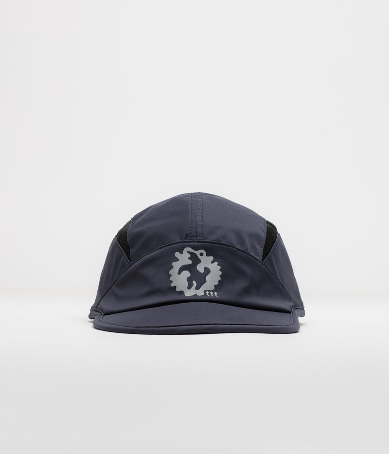 The Trilogy Tapes Clogged Bear Running Cap in Metallic Navy and Black