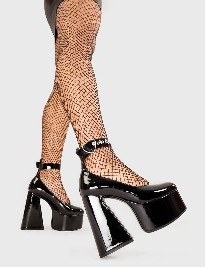 WISHLIST
  
  Those Days Platform Heels in Black patent. These platform boots feature a silver heart buckle with a flared heel, keeping it nice and classy. Made with eco-friendly materials and 100% cruelty-free, these platform boots are as ethical as they are chic.
  
  - Platform Height
  - Silver Heart buckles
  - Adjustable straps
  - Flared heel
  - High Heel
  - 100% vegan 
  
  SKU: LMF 3344 - BlackPAT