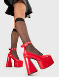 WISHLIST
  
  Those Days Platform Heels in Red patent. These platform boots feature a silver heart buckle with a flared heel, keeping it nice and classy. Made with eco-friendly materials and 100% cruelty-free, these platform boots are as ethical as they are chic.
  
  - Platform Height
  - Silver Heart buckles
  - Adjustable straps
  - Flared heel
  - High Heel
  - 100% vegan 
  
  SKU: LMF 3344 - RedPAT