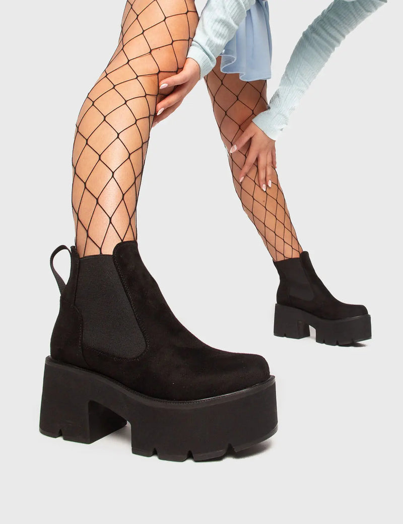 ANYTIME, ANYWHERE. 
  
  Tough Love Chunky Platform Ankle Boots in Black faux suede. These faux suede vegan Boots feature an elastic gusset and our CHUNKY Platform sole, making them the perfect comfy Boots for any occasion. Made with eco-friendly materials and 100% cruelty-free, these boots are as ethical as they are comfy!
  
  
  - Platform Height: 3 inch
  - Low ankle length 
  - Black elastic gusset
  - Black pull tab
  - Cunky Platform sole
  - Round toe 
  - 100% vegan 
  
  SKU: LMF104 BLACK SUEDE