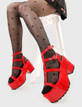 Dreamy Heights
  
  Turquoise Breeze Chunky Platform Sandals in Red patent faux leather. These platform sandals feature an adjustable red strap detail with silver eyelets, perfect balance of style and cuteness. Made with eco-friendly materials and 100% cruelty-free, these platform boots are as ethical as they are Comfortable.
  
  - Platform Height
  - Heel Height
  - Adjustable red strap
  - Silver eyelets with 'O' shaped buckle
  - Chunky Platform sole
  - Shark's teeth grip
  
  SKU: LMF 2537 - RedPAT