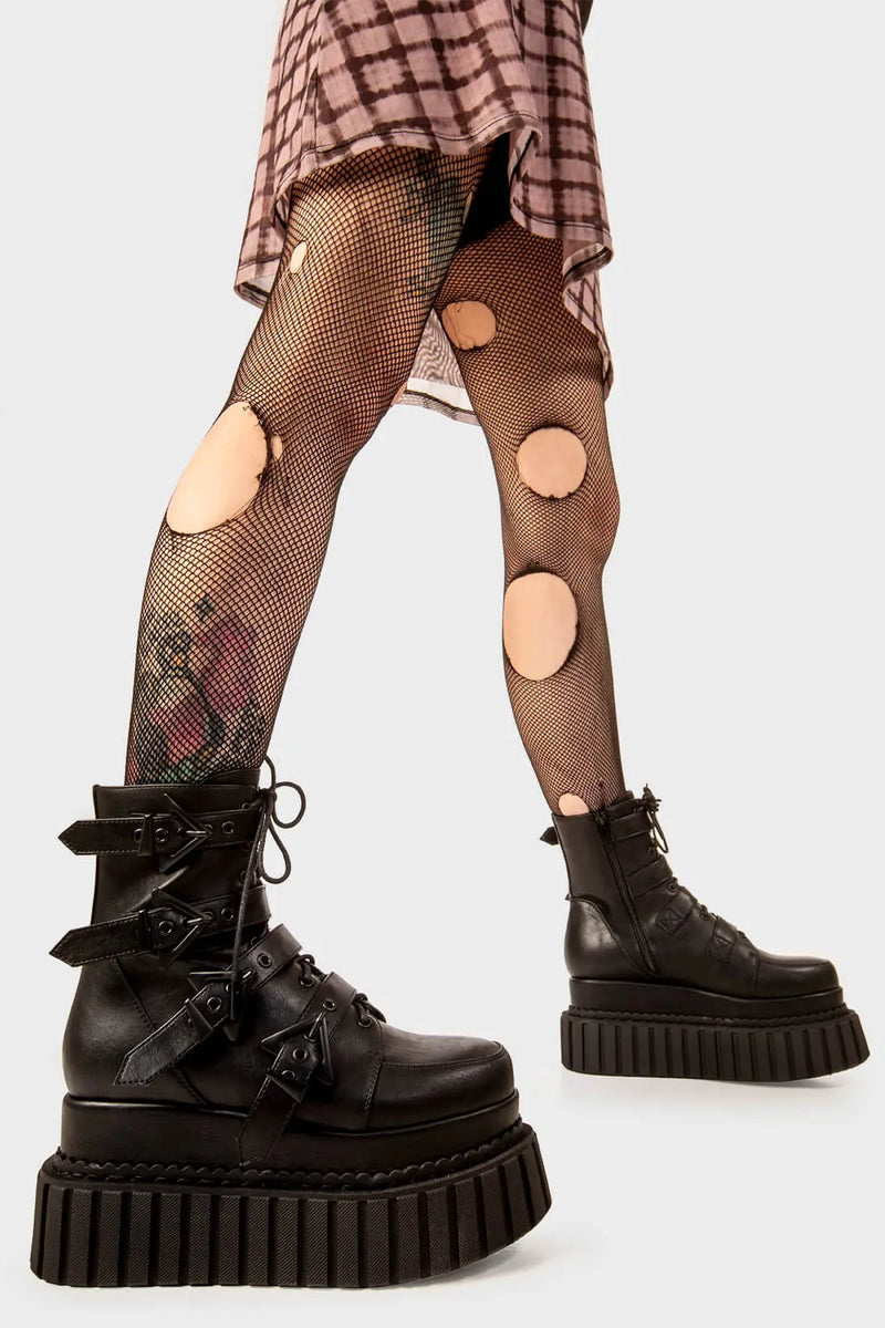 Solid Stompers
  
  Unstable Chunky Ankle Creeper Boots in black faux leather. These black Creeper Boots feature four adjustable black straps with triangular shaped buckles with black lace up detail, let the boots do the talking. Made with eco-friendly materials and 100% cruelty-free, these platform boots are as ethical as they are BOLD!
  
  - Platform Height: 5.4 inch
  - Four black straps
  - Black laces
  - Black eyelets and triangular shaped buckles
  - Chunky creeper sole
  
  SKU: LMF 2183 - BlackPU