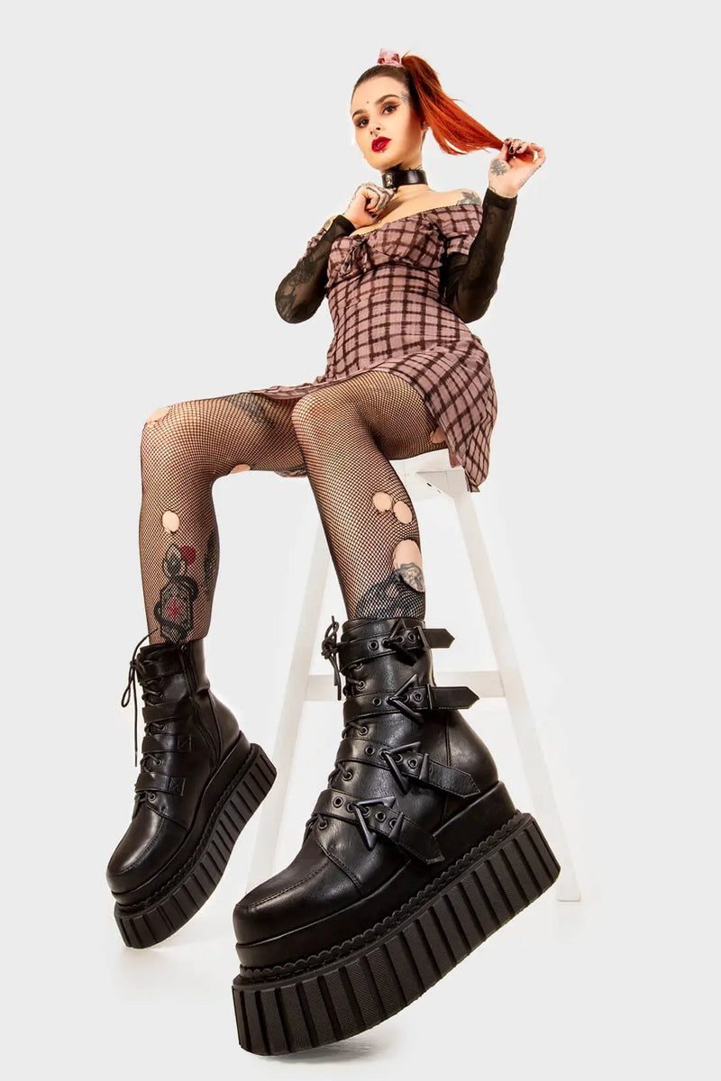 Solid Stompers
  
  Unstable Chunky Ankle Creeper Boots in black faux leather. These black Creeper Boots feature four adjustable black straps with triangular shaped buckles with black lace up detail, let the boots do the talking. Made with eco-friendly materials and 100% cruelty-free, these platform boots are as ethical as they are BOLD!
  
  - Platform Height: 5.4 inch
  - Four black straps
  - Black laces
  - Black eyelets and triangular shaped buckles
  - Chunky creeper sole
  
  SKU: LMF 2183 - BlackPU
