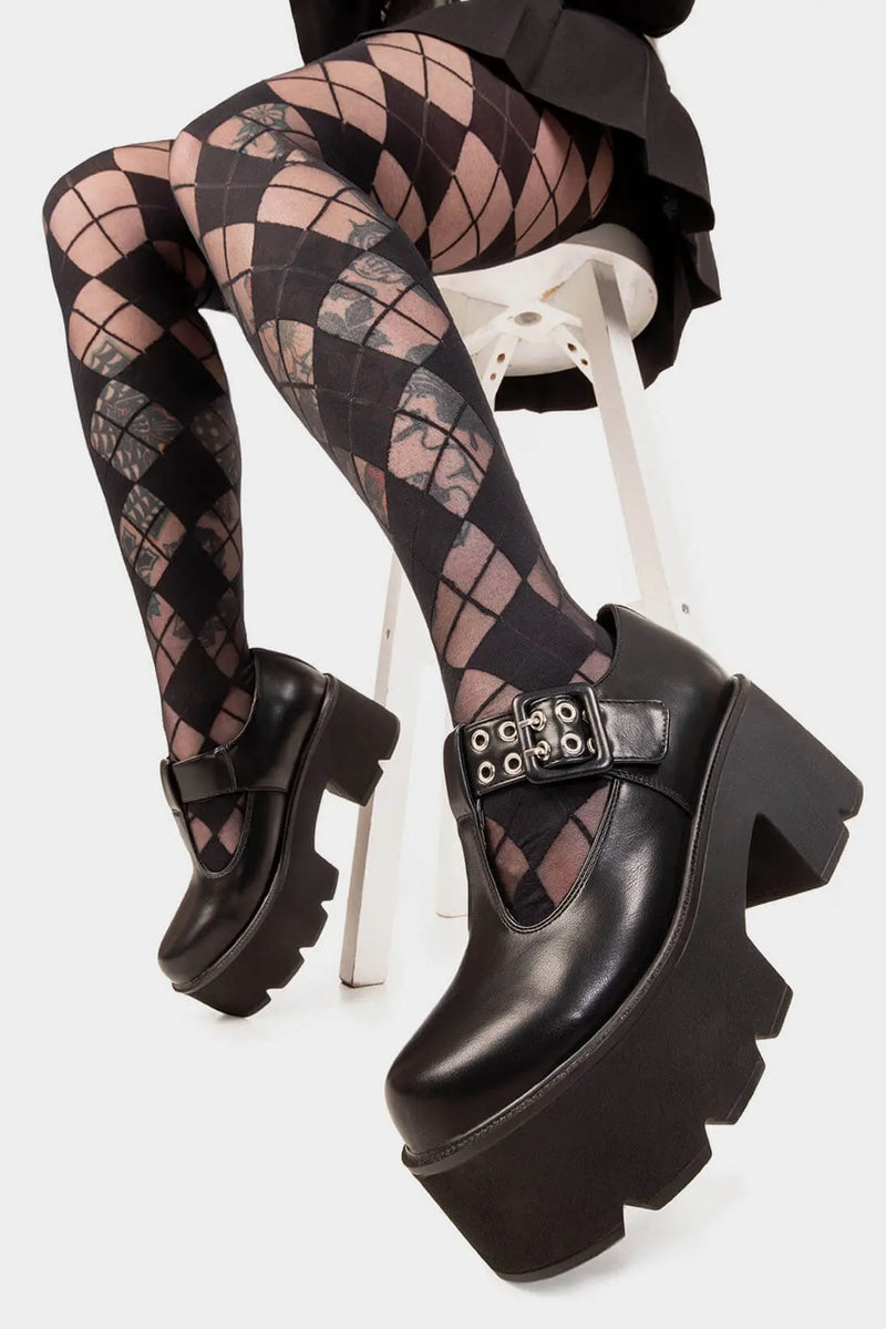 THE SHOEDROBE STAPLE
  
  Watch Me Chunky Mary Jane Shoes in Black faux leather. These Mary Janes feature a Chunky and comfortable Platform sole. Everyone needs a pairs of Mary Janes! Made with eco-friendly materials and 100% cruelty-free, these Sandals are as ethical as they are cute!
  
  
  - Platform Height: 3 inch
  - T Bar structure
  - Square buckle and silver eyelets
  - Chunky Platform sole
  - Round toe 
  - 100% vegan 
  
  SKU: LMS 121 - Black