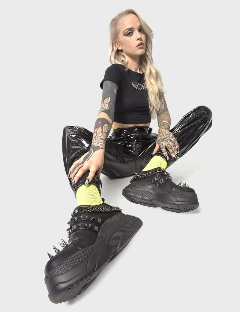 HEADTURNERS ALERT
  
  Watch Out Chunky Platform Sneakers in Black faux leather. These vegan Chunky Sneakers feature silver spikes, studs and hanging chains, making them the hottest Chunky Sneakers available! Made with eco-friendly materials and 100% cruelty-free, these Sneakers are as ethical as they are striking!
  
  
  - Platform Height: 2.7 inch
  - Silver spikes, studs and chains 
  - Black zipper 
  - Black pull tab
  - Cunky Platform sole
  - Round toe 
  - 100% vegan 
  
  SKU: LMF 0182 - BlackPU