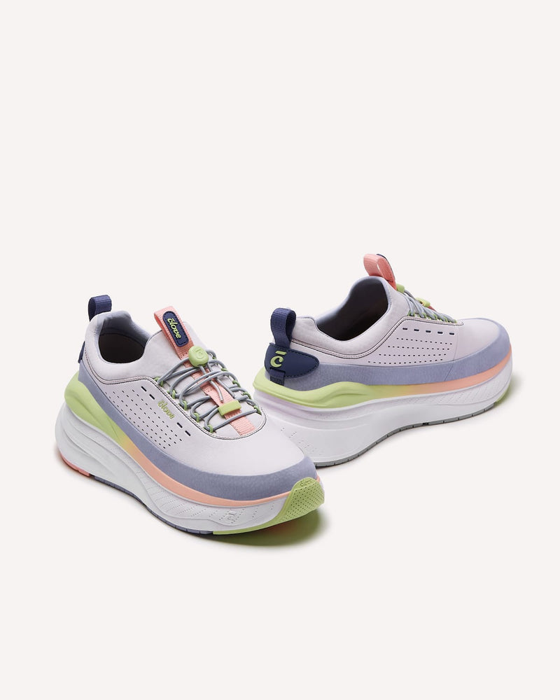 Pair of pastel-colored sneakers on a white background