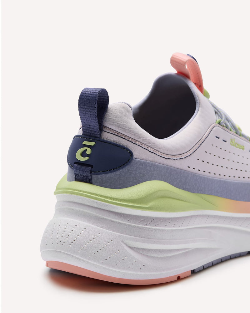 Multicolored sneaker with a focus on the sole and side on a white background