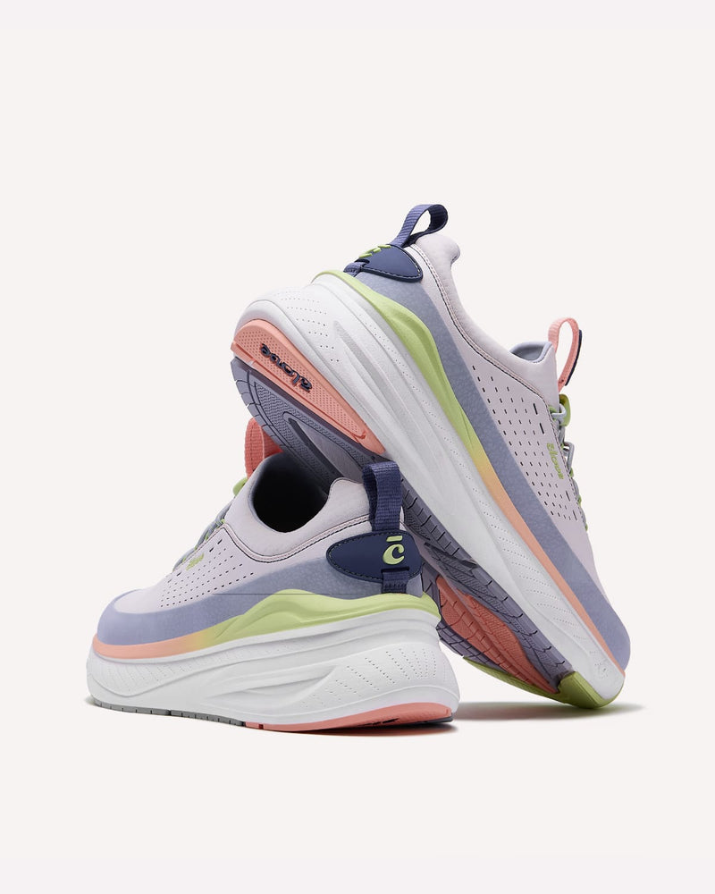 Pair of pastel-colored running shoes on a white background